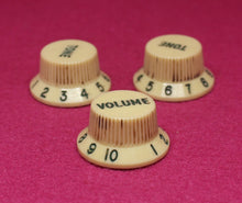 Load image into Gallery viewer, Original Fender Aged Cream Knobs with Green Font for Fender® Stratocaster
