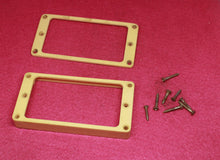 Load image into Gallery viewer, Aged Cream Humbucker Mounting Rings For Gibson Guitars  with M69 Screws -  S#2
