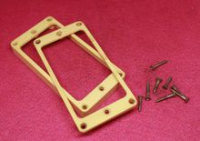 Load image into Gallery viewer, Aged Cream Humbucker Mounting Rings For Gibson Guitars  with M69 Screws -  S#2
