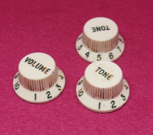 Load image into Gallery viewer, Original Fender Aged Parchment Knobs with Green Font for Fender® Stratocaster
